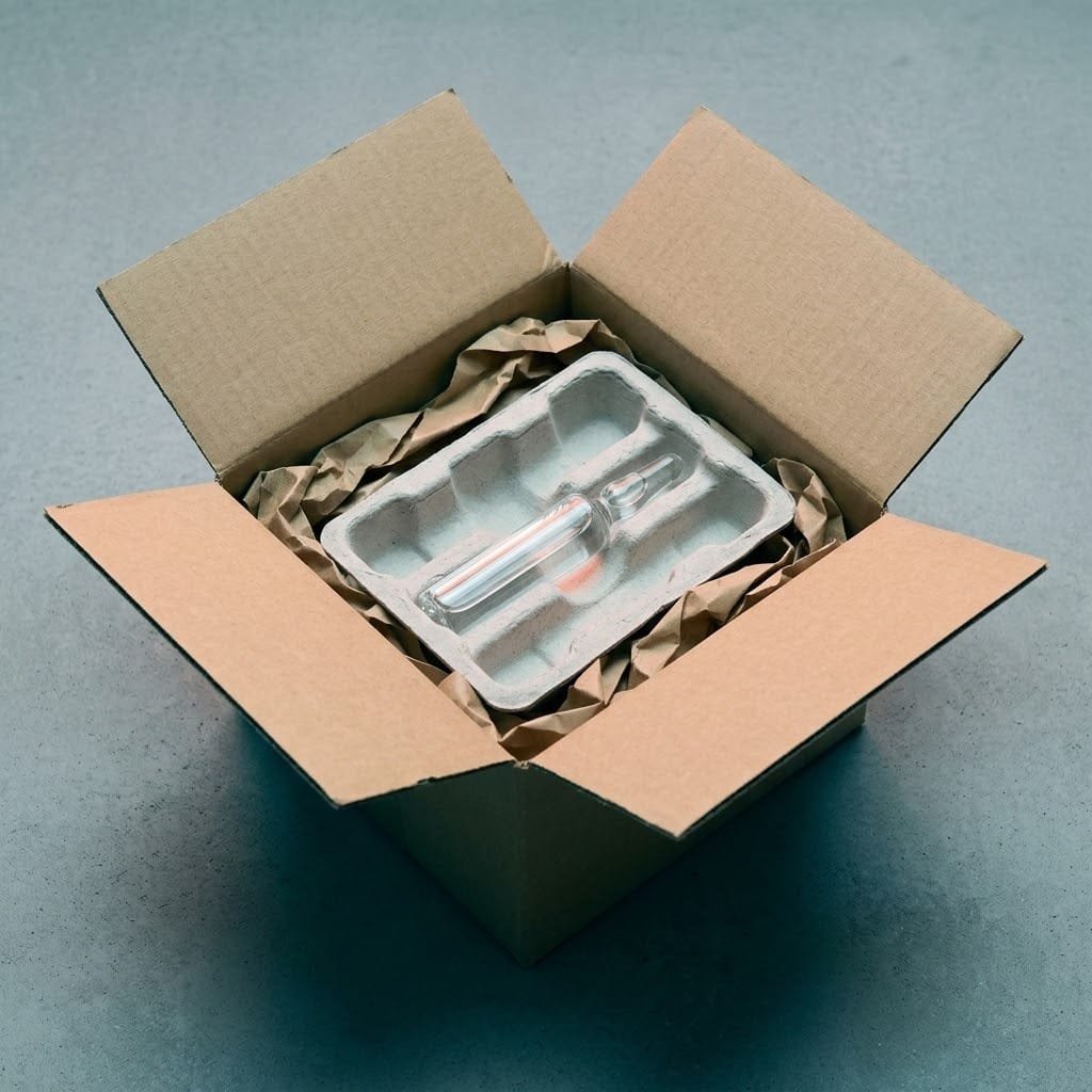A single Revital ampoule packed in a shipping carton, the supply route it travels